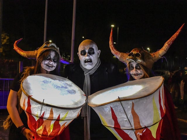 Participants the ‘City of the Bones’ Halloween carnival parade on Friday evening.  Photo: George Sweeney