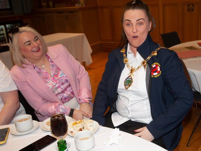 Trying the Mayor's chain.
