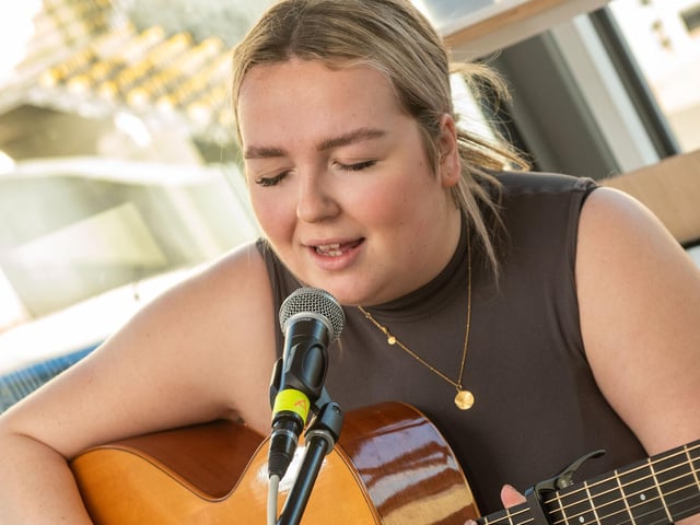 HNC music student Katie Lynch performs for visitors at NWRC's Open Day at Strand Road campus.