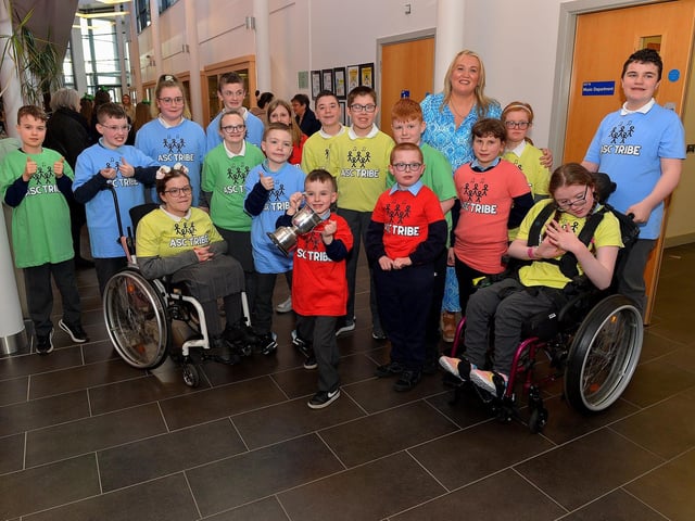 Ardnashee School and College choir were winners of the Unison special award at the Derry Feis Choir Competitions held in St Mary’s College on Tuesday. Included in the photograph is musical director Brid Cutliffe. Photo: George Sweeney. DER2314GS – 01