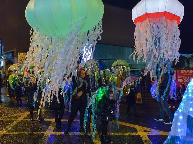 The Halloween carnival parade ‘On the Ninth Wave’ make their way along the Strand Road on Monday evening.  Photo: George Sweeney.  DER2244GS – 081