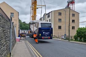 The coach being lifted by the crane at the Spencer Road/ Fountain Hill junction.