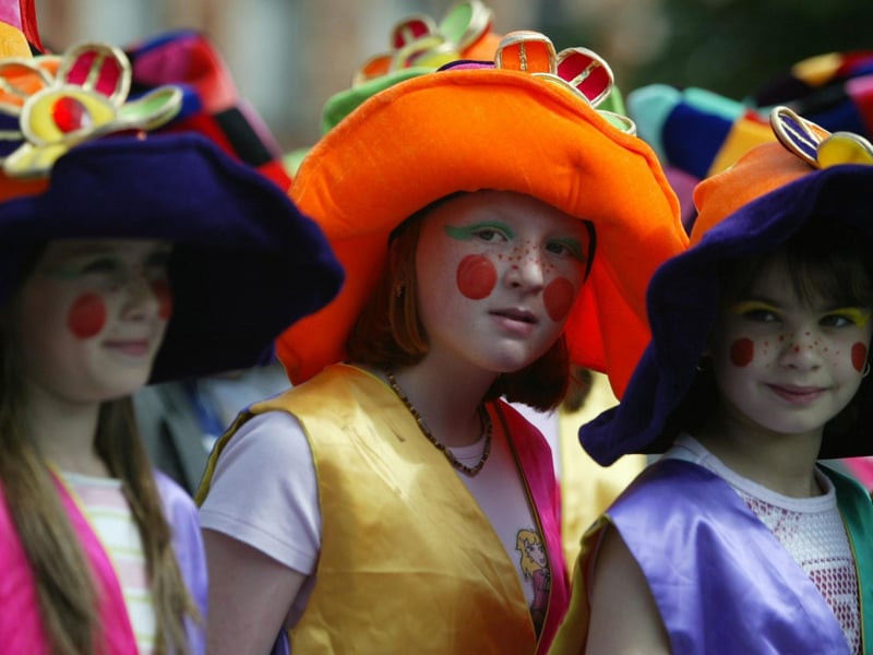 Three young participants of the Hiring Fair carnival parade in Strabane.