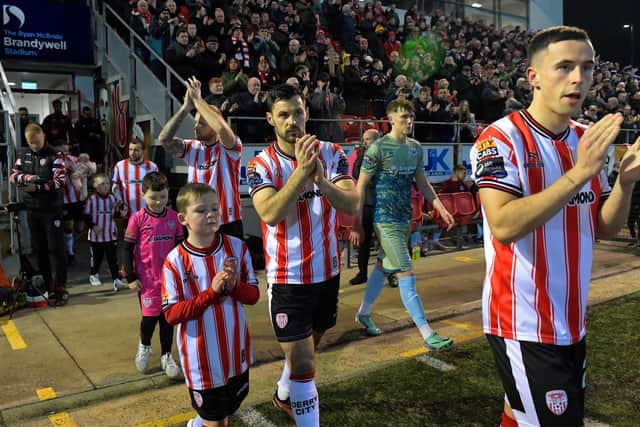 Derry City players make their way onto the pitch for the game against Drogheda United. Photograph: George Sweeney