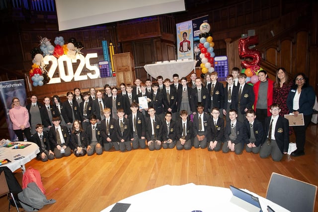 NI Maths Fest event organiser Dr. Sumeeta Gupta pictured with students from Lumen Christi and their teachers at Friday's event in the Guildhall.