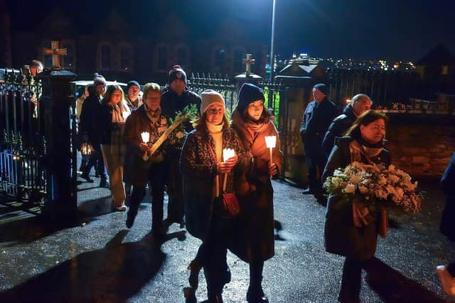 Relatives gather after mass at St Columba’s Church to take part in a wreath laying event, at Strabane Old Road, on the 50th Anniversary of the Annie’s Bar massacre. Photo: George Sweeney. DER2251GS – 17