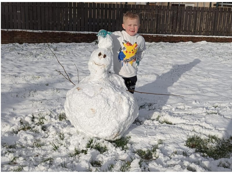 Jayden and his snowman. Photo: Clare Doherty.