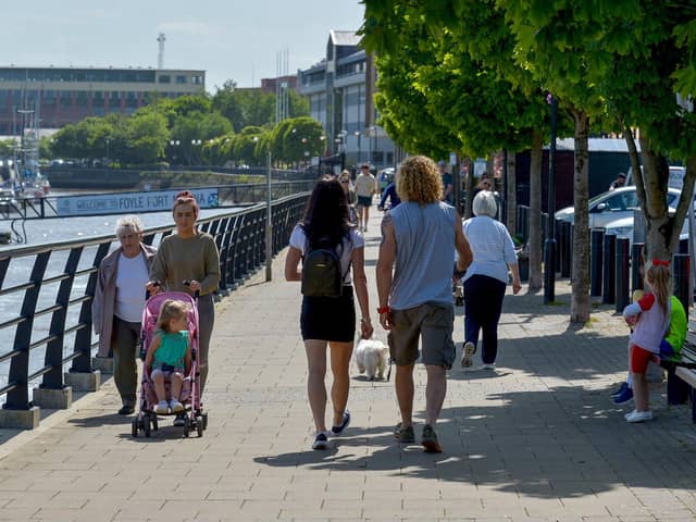 People pictured previously enjoying the sunshine, along the Foyle Embankment. DER2220GS - 014