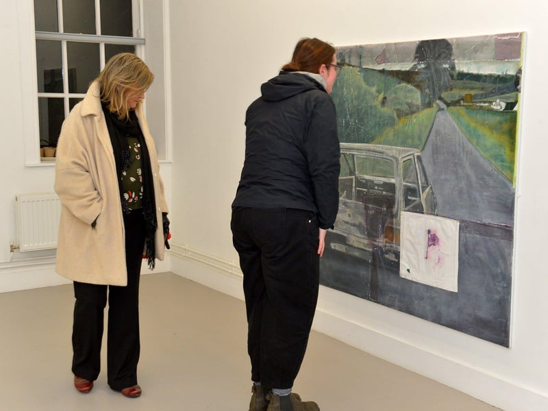 Visitors view Derry born Richard Magee’s ‘Ghost in a machine says some thing’s in the way (after Willie Doherty) exhibit at the Centre for Contemporary Art’s ‘Urgencies’ Exhibition which runs until 18th March next. Photo: George Sweeney. DER2304GS – 31