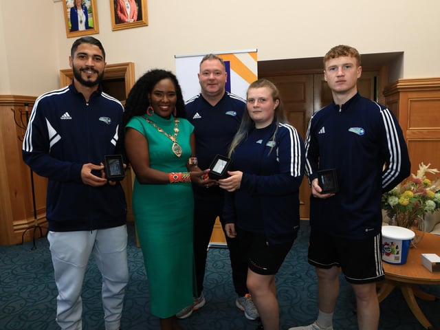 Mayor Lilian Barr making a presentation to three players from Street Soccer NI who will be travelling to South Korea to take part in the Homeless World Cup 2024 in Seoul. Included left are Alaaeddine Dhouioui, Adrian Curry, co-ordinator Street Soccer NI, Joanne Patterson, and Eoghan Dobbins. (Photo - Tom Heaney, nwpresspics).
