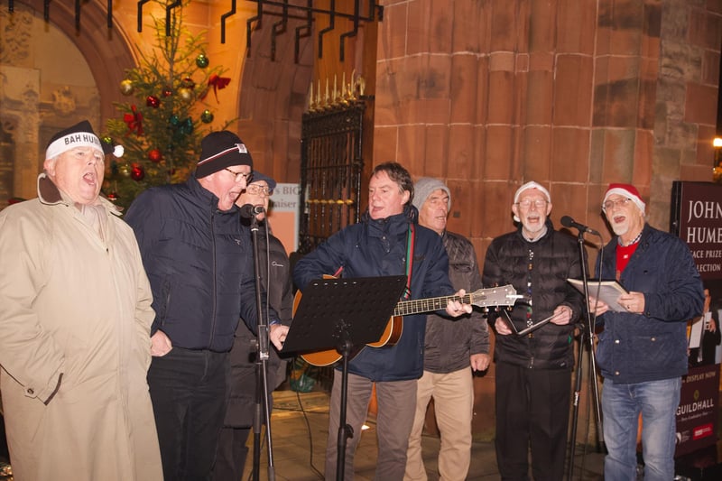 The Villagers performing on the steps of the Guildhall.
