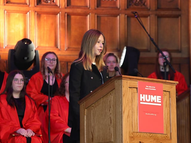 Rachel Hume introducing Bill Clinton