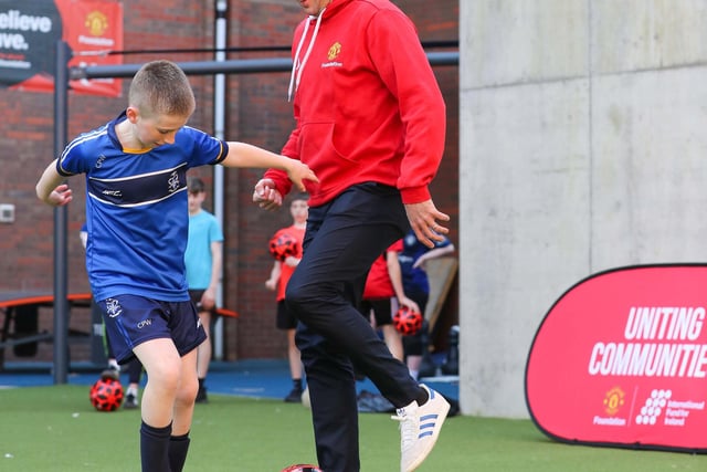 Former Manchester United and Republic of Ireland defender John O’Shea enjoying a coaching session with Foundation participant Caiden.