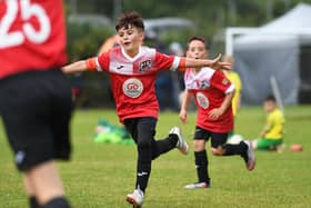 Maiden City Colts Under-9's player Morgan Feely celebrates his goal during their match against TOTHC Colts at Broadbridge.