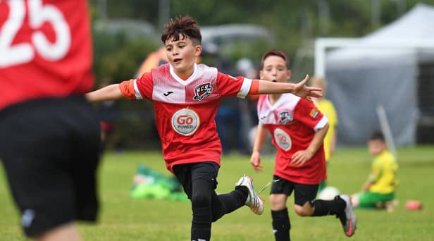 Maiden City Colts Under-9's player Morgan Feely celebrates his goal during their match against TOTHC Colts at Broadbridge.