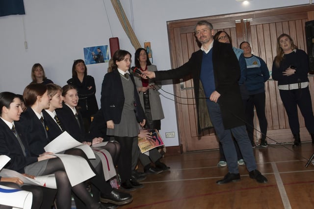 A year 8 student at Lumen Christi asks a question of Damian during Tuesday’s visit.