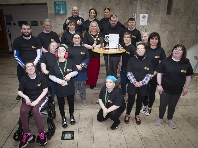 The Mayor of Derry City and Strabane District Council, Sandra Duffy pictured with some of the members from the Stage Beyond Theatre Company at the Millennium Forum on Monday last and some of the awards the group have picked up this year.