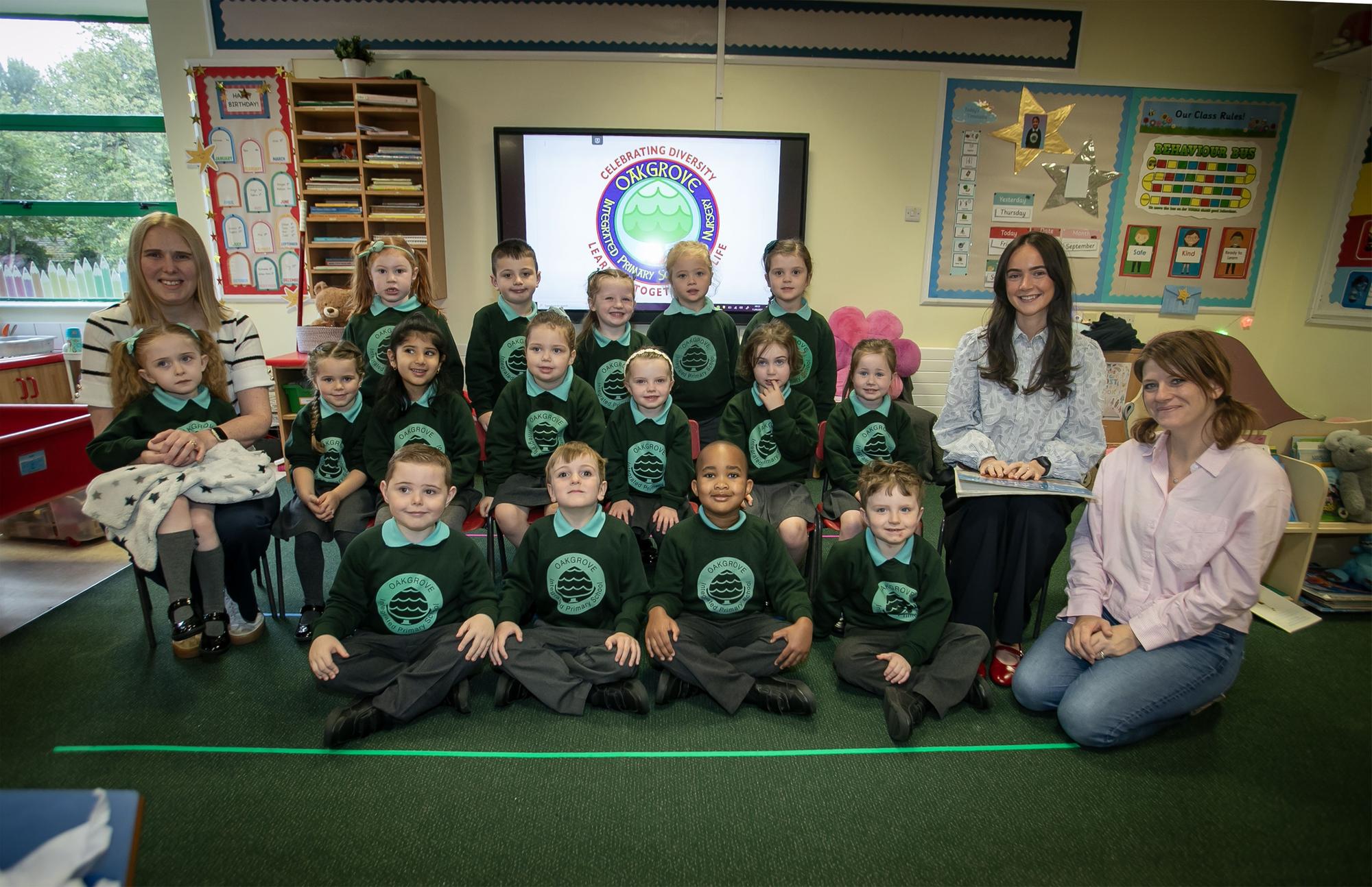 Miss Maeve Flynn's Primary One class at Oakgrove Integrated Primary and Nursery School pictured on Friday last. Included are Classroom Assistants Mrs. Rachel Sherrard and Mrs. Ruth O'Callaghan. (Photos: Jim McCafferty Photography)