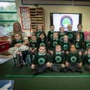 Miss Maeve Flynn's Primary One class at Oakgrove Integrated Primary and Nursery School pictured on Friday last. Included are Classroom Assistants Mrs. Rachel Sherrard and Mrs. Ruth O'Callaghan. (Photos: Jim McCafferty Photography)