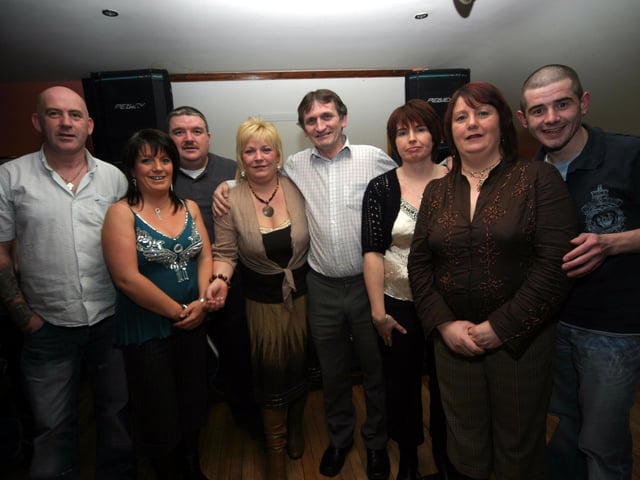 Matilda poses for a photograph with some of her party revellers. 0016/JML
