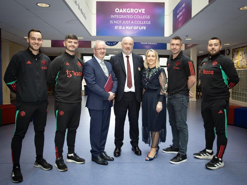 Mr. John Shiels, CEO, Manchester United Foundation pictured with John Harkin, Principal and Kellie-Marie Martin, Vice-Principal, Oakgrove Integrated College, during last week's Annual School Prizegiving. Included are Manchester United Foundation officers. (Photos: Jim McCafferty Photography)