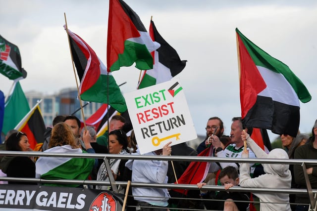 People gathered on the Peace Bridge for a Vigil for Gaza on Friday evening, organised by the Derry Irish Palestinian Solidarity Campaign. Photo: George Sweeney