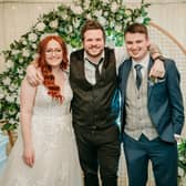James Aiken of James Aiken photography, with Rebecca and Rory, one of the many happy couples he has photographed on their big day.