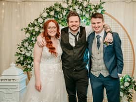 James Aiken of James Aiken photography, with Rebecca and Rory, one of the many happy couples he has photographed on their big day.