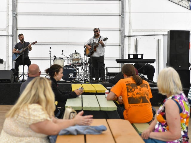 People enjoy the entertainment at the Family Fun Day at Fahan Marina on Sunday afternoon. Photo: George Sweeney
