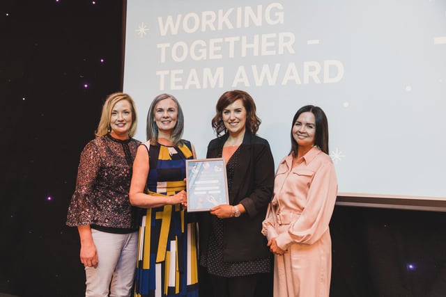 Highly Commended in the Working Together Team Award category is Creggan Day Centre, Derry, pictured with Karen Hargan, Director of Human Resources & Organisation Development.