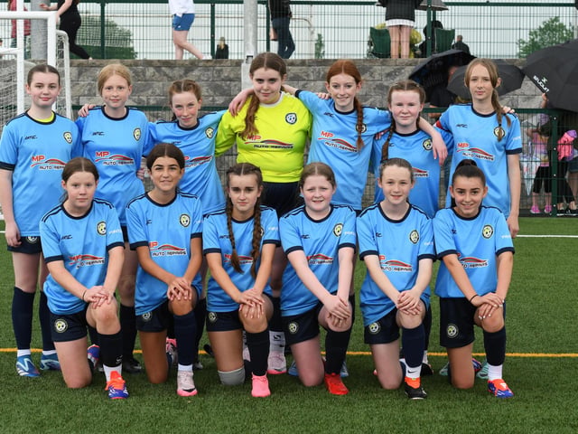 The Sion Swifts Flames Girls Under-13's team at the Shared Village Centre.