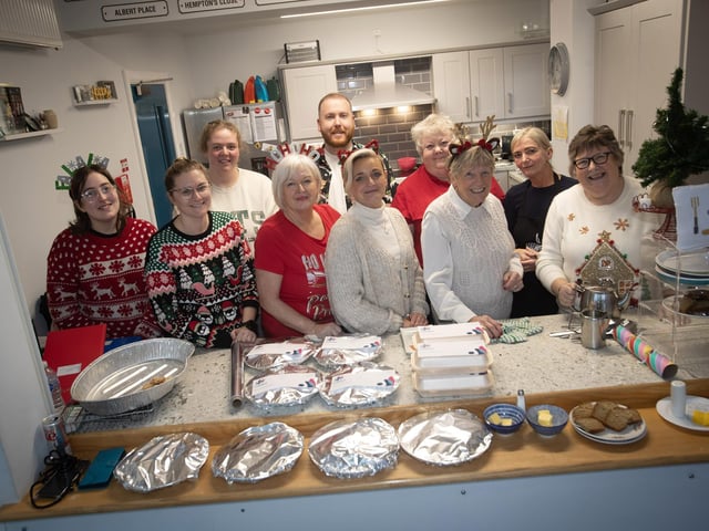 Jeanette Warke, Cathedral Youth Club pictured with staff and volunteers who served up the food for the Annual Senior Citizens Christmas Party in the club last week. (Photos: Jim McCafferty Photography)