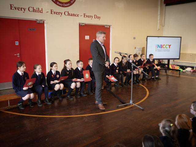 Children's Commissioner Chris Quinn addressing the school assembly on Thursday morning at Holy Child PS.
