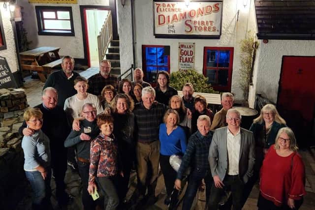 The McGettigan cousins and extended family who celebrated their 60th birthday in the Harbour Bar in the Downings.