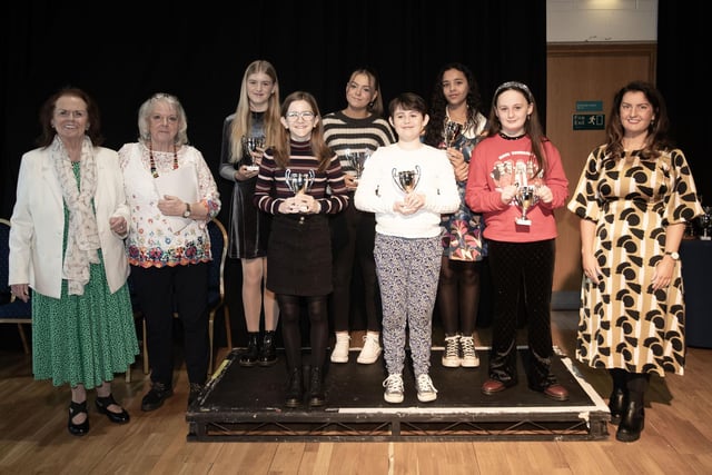 Una O'Somachan, Maire Worth and Blathnaid Biddle pictured with the intermediate class group at last week's Charity Feis.