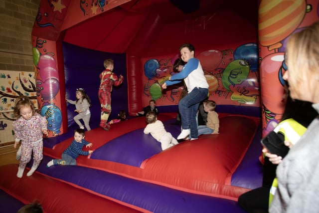 Fun on the bouncy castle at Monday's Fun Day in Long Tower Youth Club.