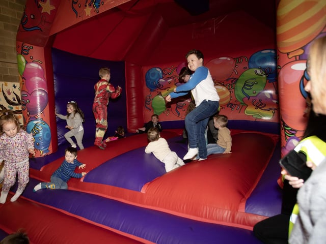 Fun on the bouncy castle at Monday's Fun Day in Long Tower Youth Club.