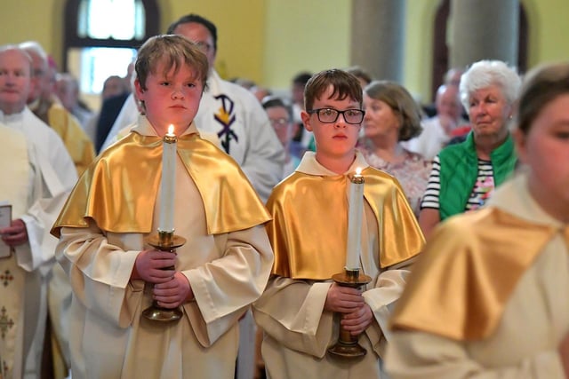 Altar servers at a Mass to celebrate Father Con McLaughlin’s Golden Jubilee at the Church of the Sacred Heart, Carndonagh, on Saturday evening. Photo: George Sweeney. DER2323GS – 154