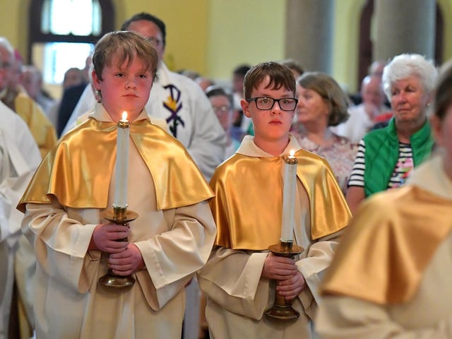 Altar servers at a Mass to celebrate Father Con McLaughlin’s Golden Jubilee at the Church of the Sacred Heart, Carndonagh, on Saturday evening. Photo: George Sweeney. DER2323GS – 154