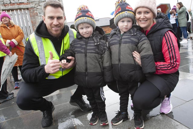 FDST’s Christopher Cooper pictured at Saturday’s Ruby’s Walk with his wife Emma and twin sons Jack and Oliver.