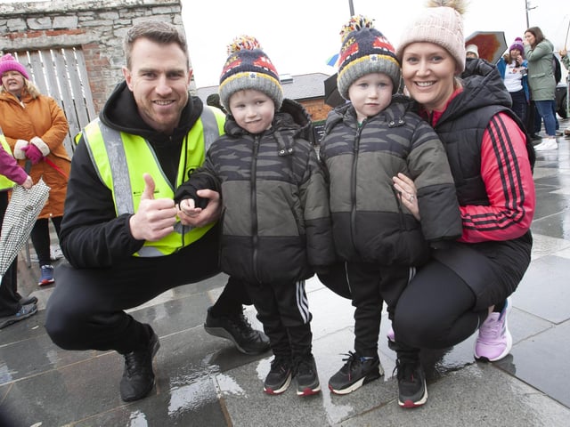 FDST’s Christopher Cooper pictured at Saturday’s Ruby’s Walk with his wife Emma and twin sons Jack and Oliver.