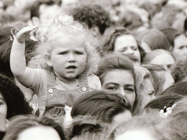 A young fan enjoying the BBC Radio 1 roadshow in 1993.