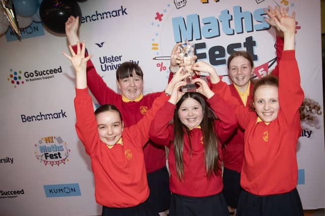 MATHS FEST CHAMPIONS!. . . .The jubilant Steelstown Primary School pupils celebrating their success on Friday. (Photos: Jim McCafferty Photography) : .