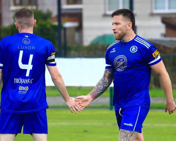 Trojans Gearoid McDermott celebrates a goal with a handshake from teammate Marc Doherty in the match against Tobermore Utd. in the Ballymena and Provincial League game held in Oakland Park. (Photo - Tom Heaney, nwpresspics)