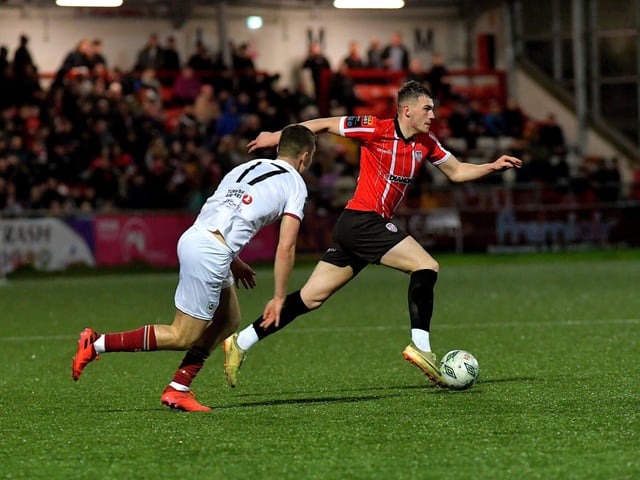 Derry City’s Ryan Graydon weaves past Drogheda United’s Jarlath Jones . Photo: George Sweeney. DER2314GS – 16