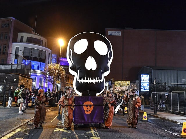 Derry’s ‘City of the Bones’ Halloween carnival parade makes its way along Strand Road on Friday evening. Photo: George Sweeney