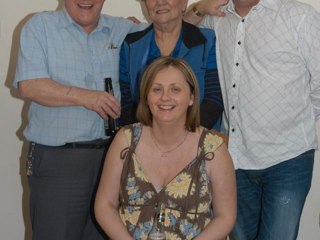 Friends and family celebrating Donna's birthday at home.