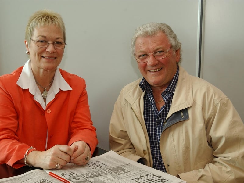 A famous face... Linda and Jackie Fullerton get ready to depart for Spain from City of Derry Airport.