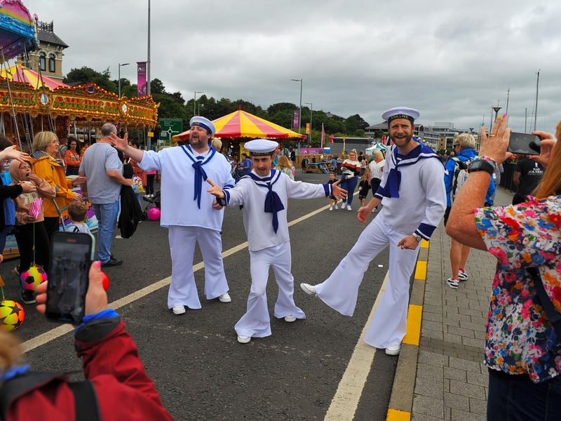 2024 heralds the return of the free Foyle Maritime Festival to the banks of the Foyle with the biennial event taking place over four days from June 27 and 30. Expect tall ships, historic ships, little boats and navy craft, live music, food and drink stalls, crafts and activities for people of all ages. The flagship festival is expected to attract more than 150,000 attendees. Pictured here are singing sailors entertaining the masses during the last Foyle Maritime Festival in 2022. Photo: George Sweeney. DER2229GS – 057