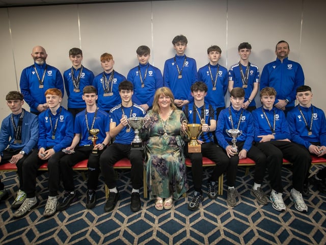 The Deputy Mayor Niree McMorris presenting Oxford United u-17s with their trophies at the Annual D&D Youth FA awards on Friday night. Included are coaches Darren Walker and Jay Cauley. (Photos: Jim McCafferty Photography)